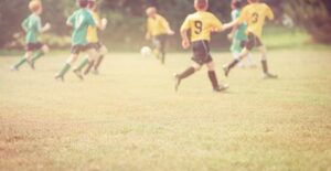 children playing soccer