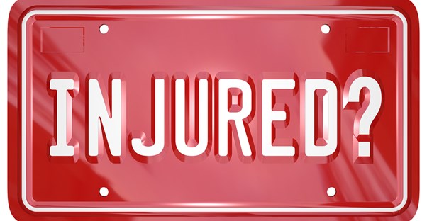 A red license plate that says Injured?