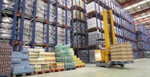 A warehouse full of inventory being tracked by inventory management software.