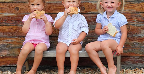 toddlers eating healthy treats