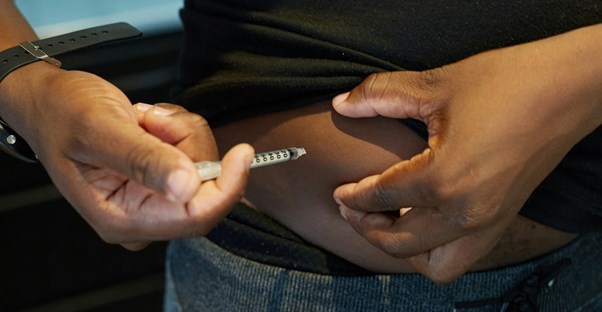 a man injects peptides into his skin
