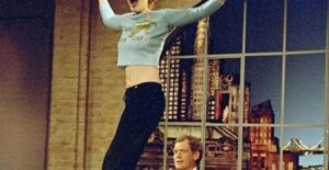 drew barrymore dancing on a late night desk