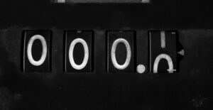 numbers rolling up on an odometer