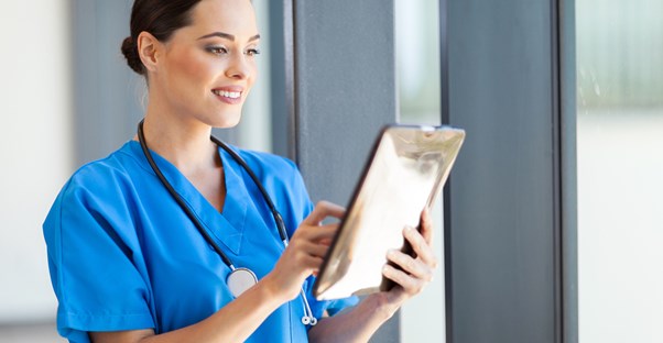 a woman looking at medical records