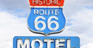 a sign for historic route 66 motel in arizona