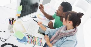 Two graphic designers working together to have successful careers.