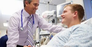 a doctor helping his patient understand gynecomastia