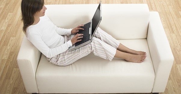 a woman chats with her long-distance love interest via her computer