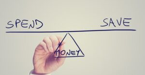 A man drawing a diagram to demonstrate how easy it is to save yourself money.