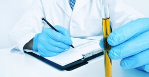 a doctor writing down five terrifying rhabdo facts