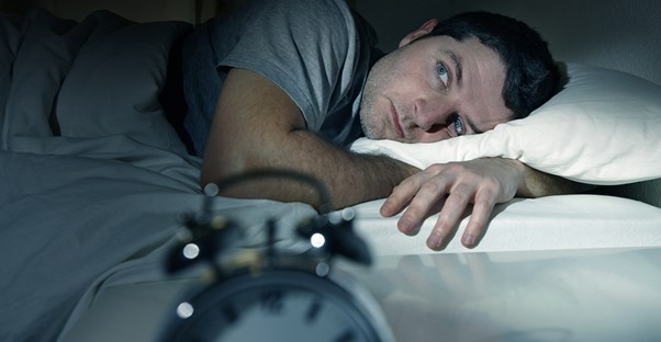 a man who is thinking about the causes of low testosterone