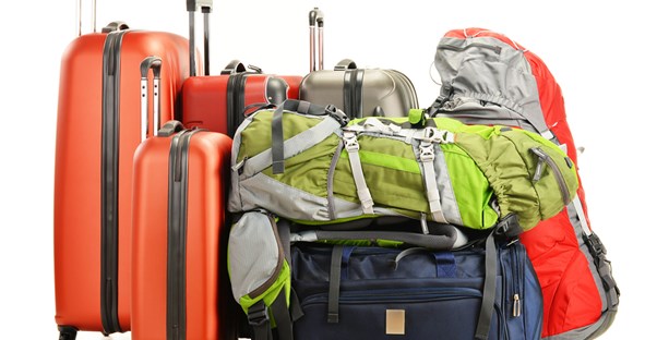 a collection of luggage options sits together in a pile