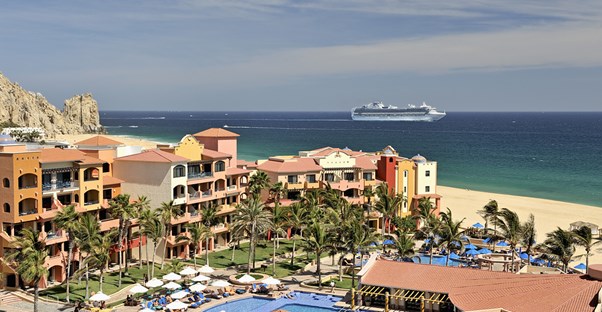 a sprawling cabo san lucas resort complex sits by the ocean