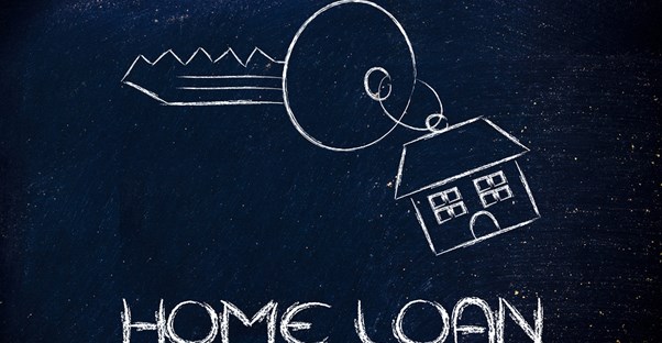 A chalkboard drawing of a house key and the words home loan drawn by an artist with bad credit.