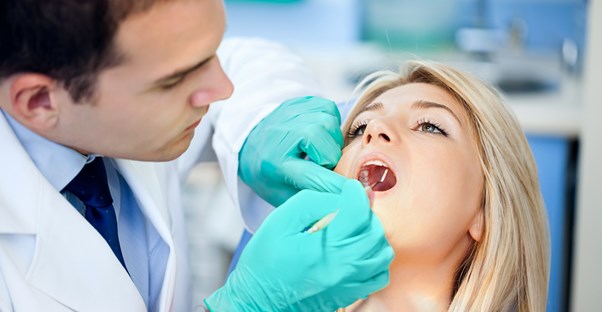 a woman who knows the five terms to know before getting dental veneers