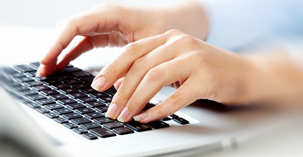 a medical transcriptionist types up doctors' notes