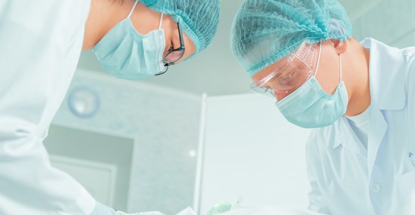 two tummy tuck surgeons