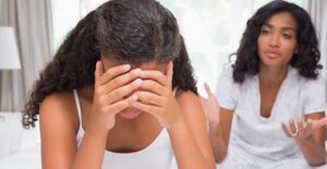 a young girl reacts negatively to her mother's bad news