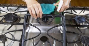 a stovetop gets a deep srubbing