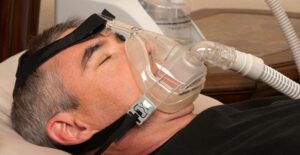a man undergoing sleep apnea treatment