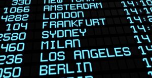 a close up view of an arrival and departure display at an airport