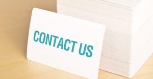 a stack of cheap business cards