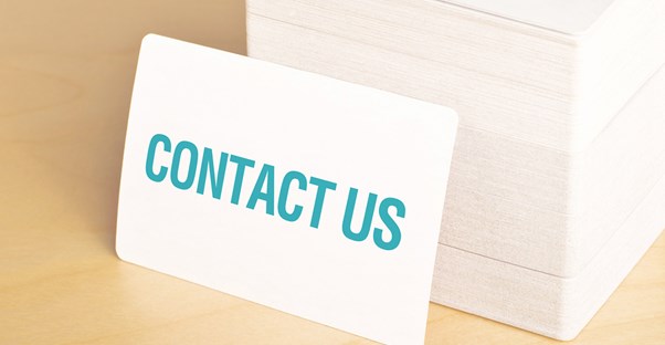 a stack of cheap business cards