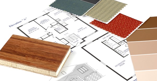 Interior design supplies sitting on a desk.