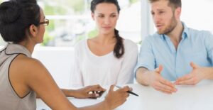 A couple discusses what they are looking for in therapy with a potential marriage counselor.