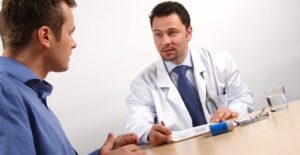 a man who is being told how to discuss a vasectomy with his spouse