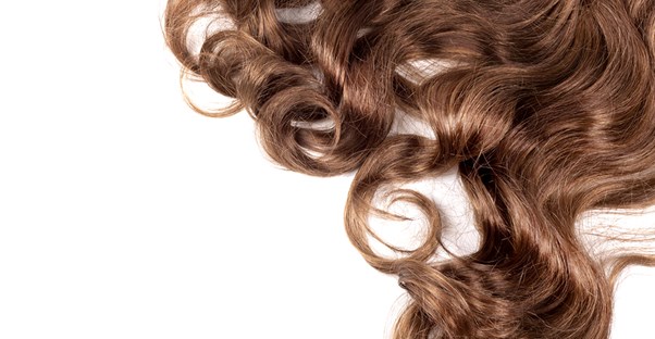 natural hair extensions lie on a table