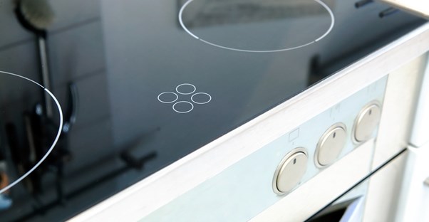 A kitchen stove that was repaired for free with an extended warranty.