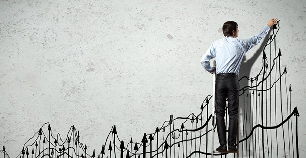 Man Drawing financial chart increasing
