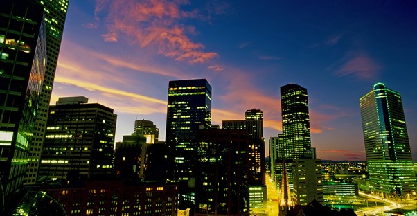 the downtown Denver skyline lights up at night