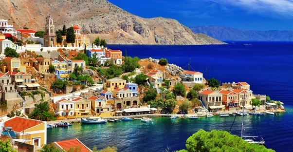 colorful vacation rental properties dot the Greek coastline