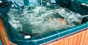 A public hot tub sitting empty after everyone bought their own hot tubs to enjoy the benefits.