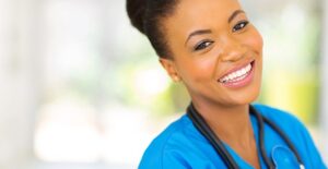 CNA smiles to show off her dimples