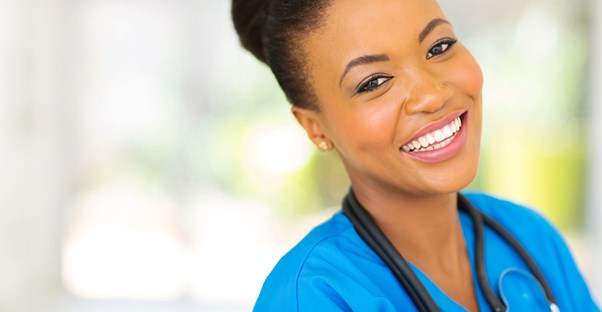 CNA smiles to show off her dimples
