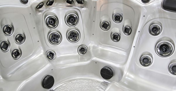 An empty hot tub or spa made by one of the top brands.