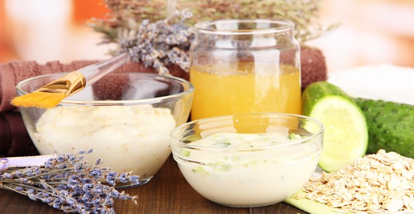 Ingredients used in natural skincare remedies sitting on a table.