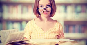 Young girl researches the pros and cons of substitute teaching