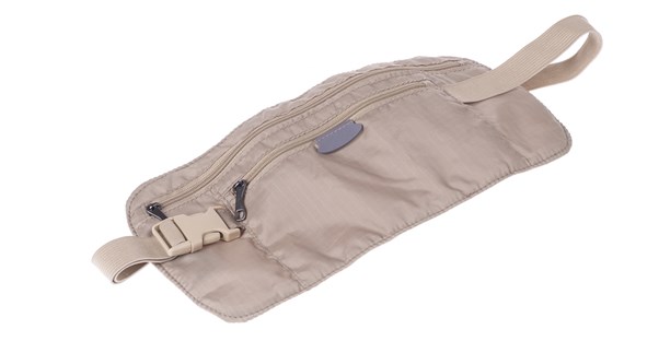 a money belt lies out ready for packing