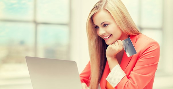 Teen shopping online with credit card