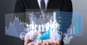 Man holding see through graphs