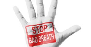 a hand that is determined to stop halitosis