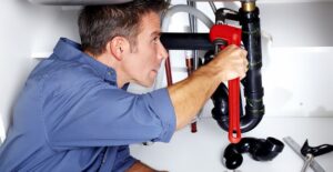Plumber fixes plumbing issues