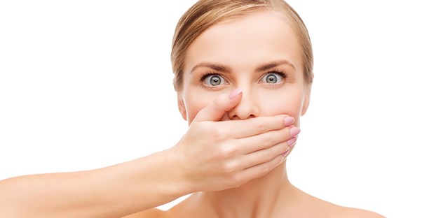 a woman who is self-conscious of her halitosis