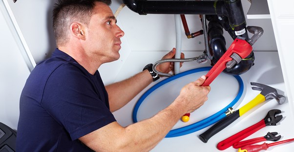 Plumber fixes things