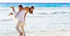 A bride with flawless wedding makeup on the beach