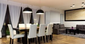 Strategically placed window treatments that make a dining room look larger.